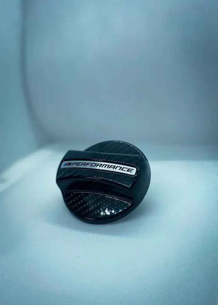 Twenty-Two-Tuning-M-Performance-Fuel-Cap-Cover-16112472988-Genuine-BMW-Product-IMG-By-XXIITUNING55_jpg_322a0d3a-d41b-4f1e-8876-8f8a523fce44.webp